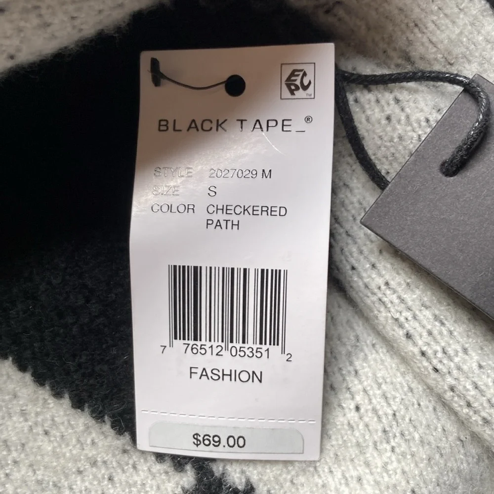 Black Tape NWT size small Black and white sweater. Excellent condition.